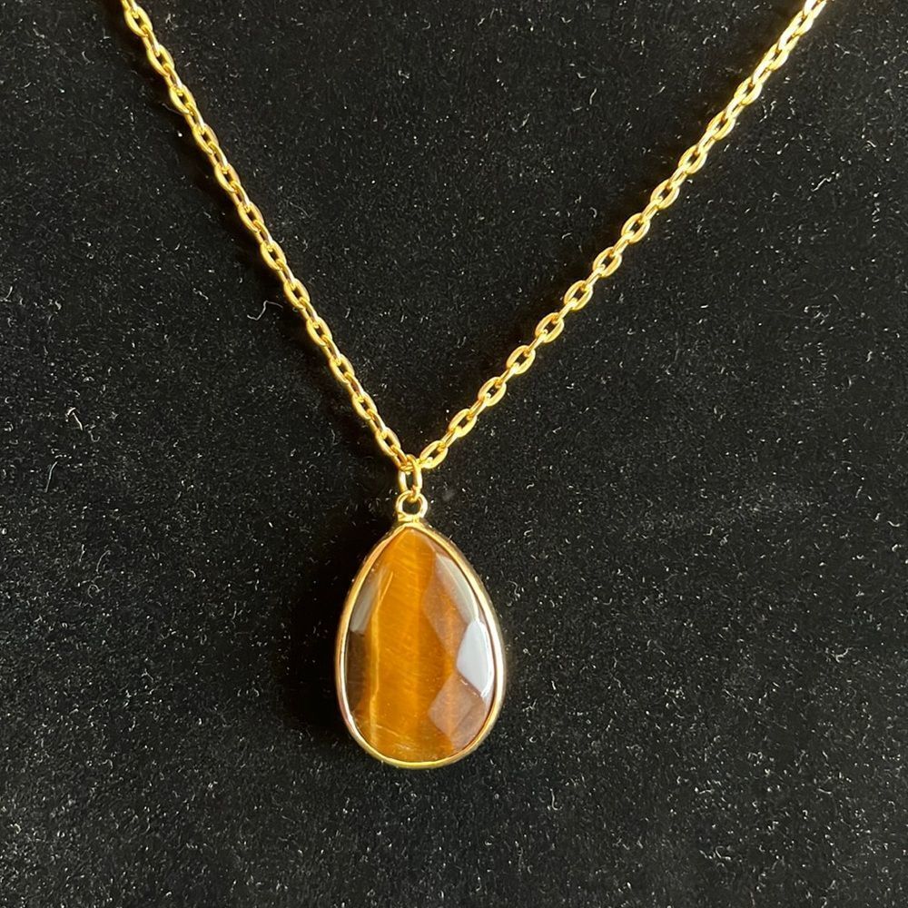 Handcrafted brown stone pendant on 25 inch gold tone chain